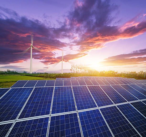 wind turbines and solar panels image